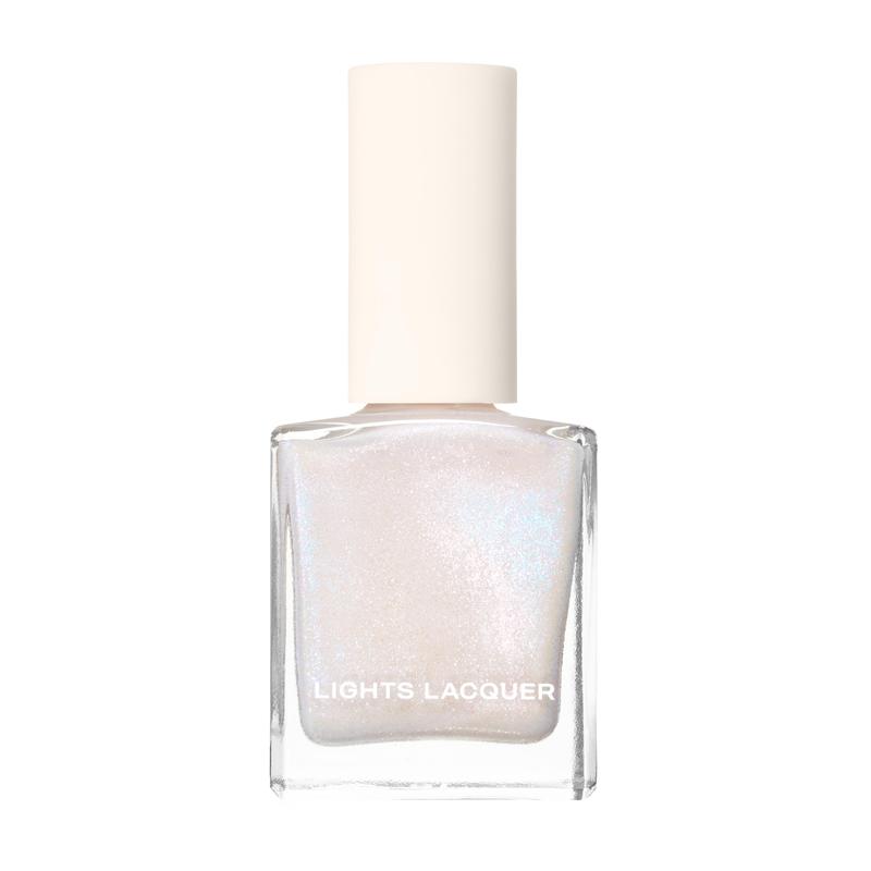 Voulez-Vous  - Soft off-white polish with a fine pink and blue shimmer finish